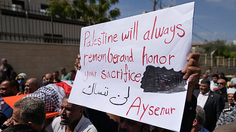 Mourners carry the body of Aysenur Ezgi Eygi, 26, who was fatally shot by Israeli soldiers while participating in an anti-settlement protest in the West Bank, during her funeral procession in the West Bank city of Nablus, Monday, Sept. 9, 2024.