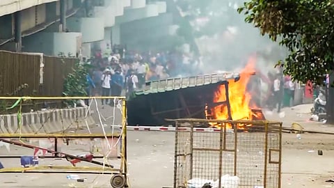 Students take part in a protest, in Imphal.