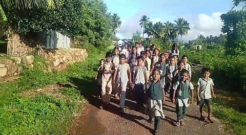 Students from the tribal communities walking to school in Sengatupatti 