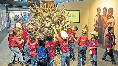 Tiny tots explore an art installation  Through the Lens  during the Vaccines Injecting Hope exhibition at Visvesvaraya Industrial and Technological Museum on Tuesday. The expo is on till February 28 