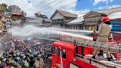  Police use water cannon to disperse protestors, who had gathered on the call of Hindu groups, demanding the demolition of an illegal structure in a mosque in Shimla.