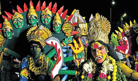 Donning mythological attire, performers take part in the Lord Ganesh idol immersion procession in Secunderabad on Thursday 