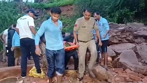 Rescue work underway after a house collapsed following heavy rainfall, in Datia district, Madhya Pradesh.