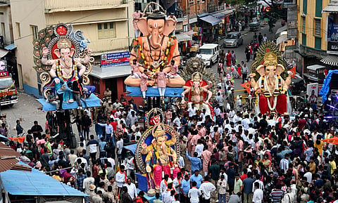 Huge Ganesha idols being taken in procession for immersion Bengaluru 