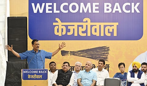 Arvind Kejriwal addressing AAP workers at party headquarters in New Delhi. 