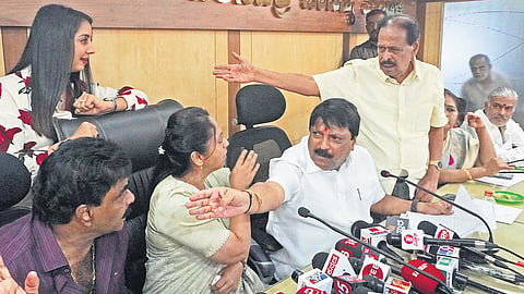 A heated argument breaks out between KFCC members and women commission chairperson Nagalakshmi Choudhary in Bengaluru on Monday | Allen Egenuse J