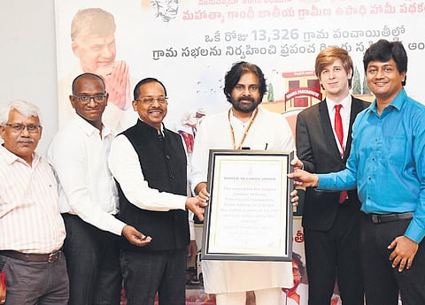 World Records Union representatives handed over the certificate of appreciation and medal to Deputy CM Pawan Kalyan in Hyderabad on Monday 