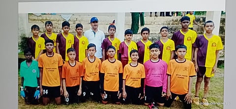 The team with the team manager.  