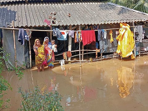A house submerged in floodwater in Uluda village under Bhograi block 