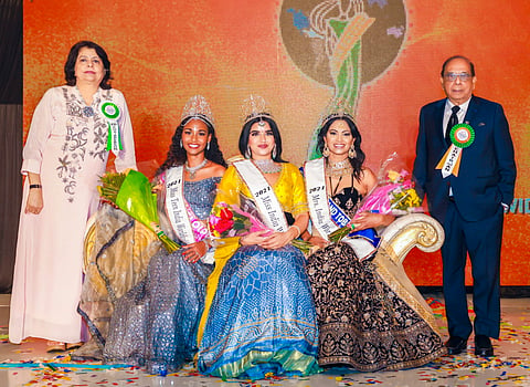 Miss India Worldwide 2024 winner Dhruvi Patel (C) from USA, Mrs. India Worldwide 2024 winner SuAnn Mouttet (2R) from Trinidad, Miss Teen India Worldwide winner Sierra Suret from Guadeloupe (2L) with others during the beauty pageant.