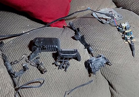 This video grab, shows a walkie-talkie that was exploded inside a house, in Baalbek, east Lebanon, Wednesday, Sept. 18, 2024.