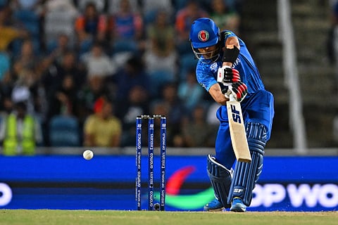 Afghanistan's Rahmanullah Gurbaz plays a shot and gets dissmissed during the ICC men's Twenty20 World Cup 2024 semi-final cricket match between South Africa and Afghanistan at Brian Lara Cricket Academy in Tarouba, Trinidad and Tobago, on June 26, 2024. 