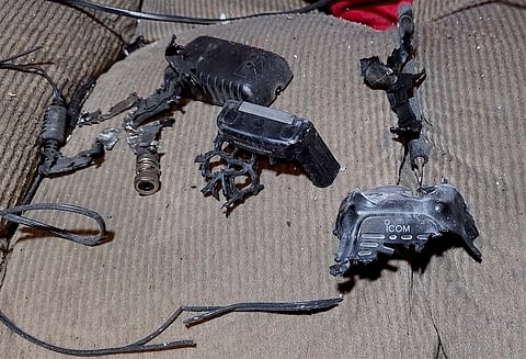This video grab shows a walkie-talkie that was exploded inside a house, in Baalbek, east Lebanon, Wednesday, Sept. 18, 2024. 