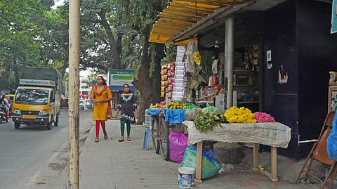 A vendor set up shop on the footpath, obstructing it completely at Wilson Garden in Bengaluru. 