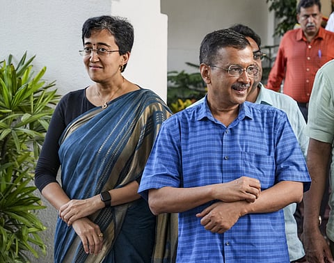 File - Former chief minister Arvind Kejriwal and Delhi CM Atishi after latter's swearing-in ceremony, at Raj Niwas, in New Delhi