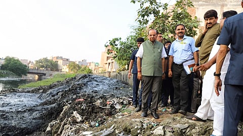 Delhi LG VK Saxena with BJP leader Manoj Tiwari during the inspection of North East Delhi-Jamuna Par areas