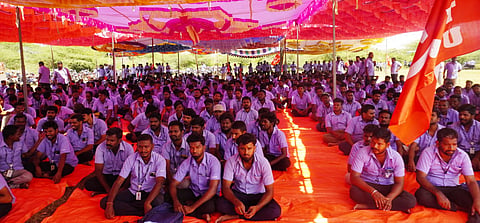 Samsung workers take part in a strike demanding higher wages and better working conditions at Sriperumbudur, Tamil Nadu