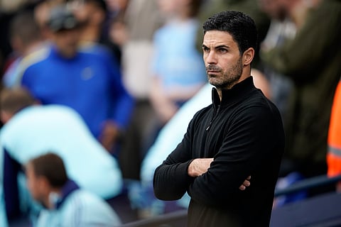 Arsenal's manager Mikel Arteta stands on the touchline before the English Premier League soccer match between Manchester City and Arsenal at the Etihad stadium in Manchester