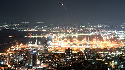 Israeli Iron Dome air defense system fires to intercept rockets that were launched from Lebanon, in northern Israel, Tuesday, Sept. 24, 2024.