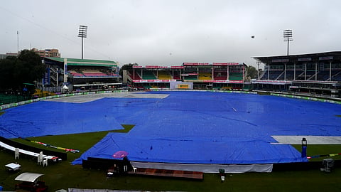 Covers placed on the ground following rains, during the second day of the second Test match between India and Bangladesh at the Green Park Stadium, Kanpur 