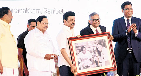 Tata Sons chairman N Chandrasekaran presenting a framed photograph of late Chief Minister M Karunanidhi with JRD Tata to CM Stalin at Panappakkam in Ranipet 
on Saturday