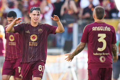 Roma's Niccolo Pisilli reacts after he scored during the Serie A soccer match between Roma and Venezia, in Rome, Italy, Sunday, Sept. 29, 2024.