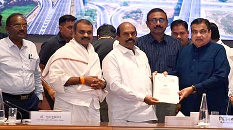 E V Velu submitting a memorandum to Union Minister Nitin Gadkari in Delhi.