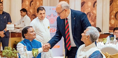 A diplomat greets CM Mohan Charan Majhi at the meeting in New Delhi 