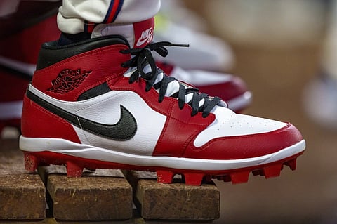 Atlanta Braves outfielder Jorge Soler wears custom Nike Air Jordan cleats in the dugout during the seventh inning of a baseball game against the Colorado Rockies, Sept. 5, 2024, in Atlanta. 