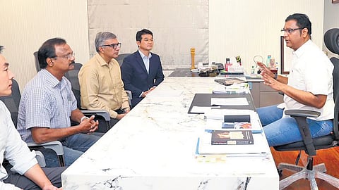 Industries Minister TRB Rajaa holding discussions with representatives of the Samsung management on Sunday 