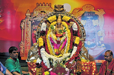 Devotees perform kumkum pooja as part of the Navaratri festivities atop Indrakeeladri in Vijayawada on Tuesday 