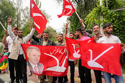 Congress party and National Conference supporters celebrate J&K Assembly poll results, in Srinagar, Tuesday, Oct. 8, 2024.