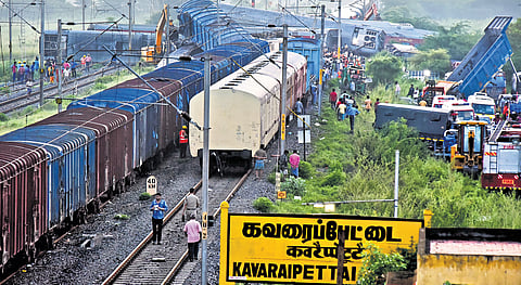 Railway workers and TNDRF personnel cleared mangled coaches of the Mysuru-Darbhanga Bagmati Express that crashed into a freight train on Friday night