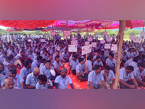 Samsung workers take part in a strike demanding higher wages and better working conditions at Sriperumbudur, Tamil Nadu