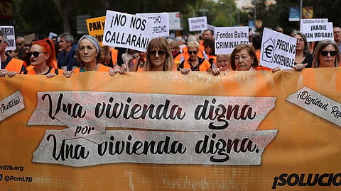 "All I want is a room somewhere...", sang Eliza Doolittle in My Fair Lady. Protestors in Spain seen demanding  a "Una Vivienda digna" (A decent home).