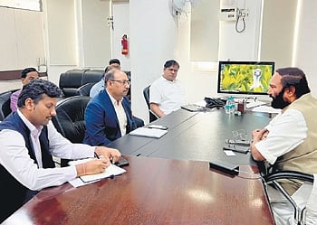 Minister N Uttam Kumar Reddy with AIIB representatives at Jal Soudha on Tuesday