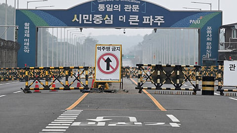 Barricades are seen at a military checkpoint on the Tongil bridge, the road leading to North Korea's Kaesong city, in the border city of Paju on October 15, 2024. 