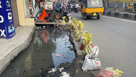 The four-and-a-half feet wide drain which was filled with rainwater 
