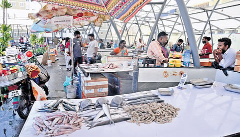 Vendors await customers at the new market in Marina 
