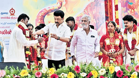 Chief Minister MK Stalin solemnising the wedding of 31 couples at an event organised by the HR & CE department in Chennai on Monday