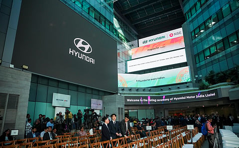  Officials during the listing ceremony of Hyundai Motor India's IPO at National Stock Exchange (NSE), in Mumbai, Tuesday, Oct. 22, 2024. 