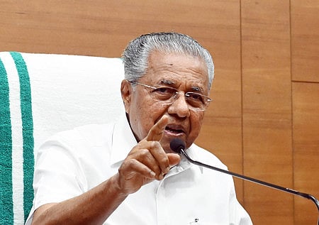 Chief Minister Pinarayi Vijayan coming out of the new regional office building of the Waqf Board in Kozhikode after its inauguration on Saturday