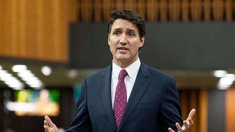 Canada Prime Minister Justin Trudeau rises during Question Period in Ottawa, Tuesday, Oct. 22, 2024.