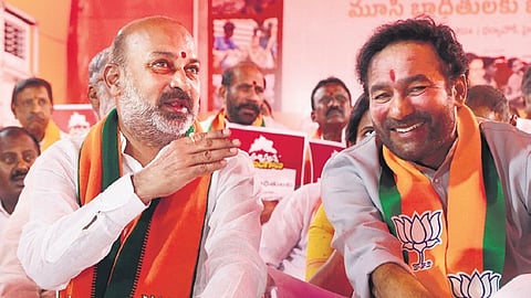 Union Minister G Kishan Reddy along with MoS (Home) Bandi Sanjay during the protest against demolition of homes of the poor for the Musi project, in Hyderabad on Friday 