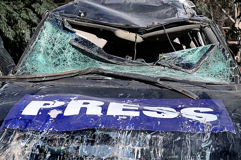 A destroyed journalists car is seen at the site where an Israeli airstrike hit a compound housing journalists, killing three media staffers from two different news agencies according to Lebanon's state-run National News Agency, in Hasbaya village, southeast Lebanon, Friday, Oct. 25, 2024. 
