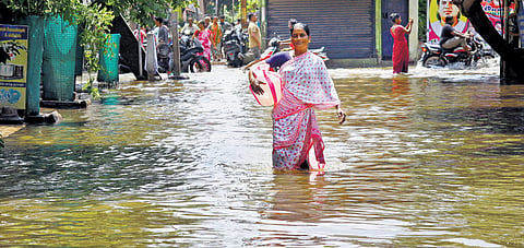Water overflowing from Pandalkudi channel inundated houses in Sellur Kattabomman Nagar in Madurai on Saturday 