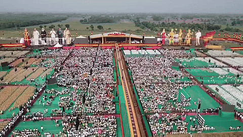 People begin to flock to the first political conference of actor Vijay-led Tamilaga Vettri Kazhagam (TVK) in Vikravandi, Tamil Nadu, on Sunday.