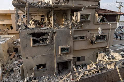 A view of a damaged home after projectiles fired from Lebanon in Tira, central Israel, Saturday, Nov. 2, 2024. 