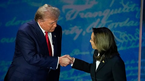 Donald Trump and  Kamala Harris shake hands before the start of an ABC News presidential debate at the National Constitution Center, Tuesday, Sept. 10, 2024.