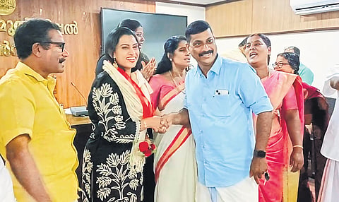 Rasiya Nishad being congratulated by LDF councillors after she was elected  chairperson of the public works standing committee of the Thrikkakara municipality